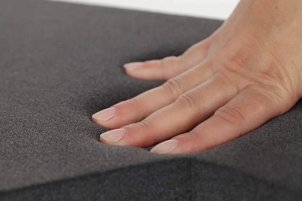 Hand touching a Fluffo soft panel